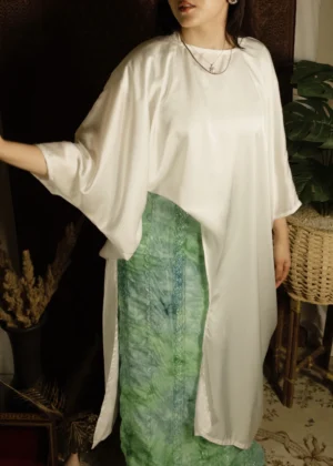 white silk top with ocean green skirt